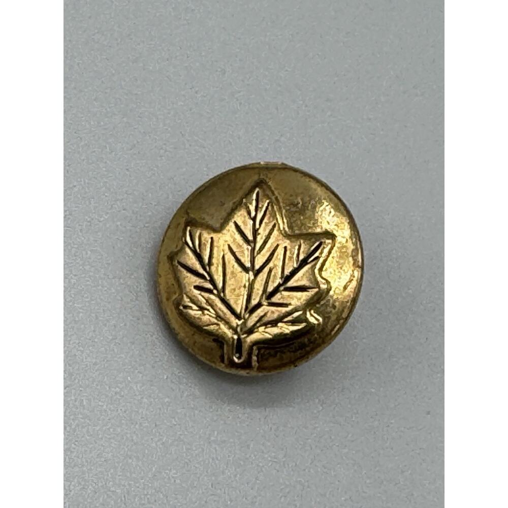 Circular Gold Colored Lapel Pin W/ Maple Leaf In Middle